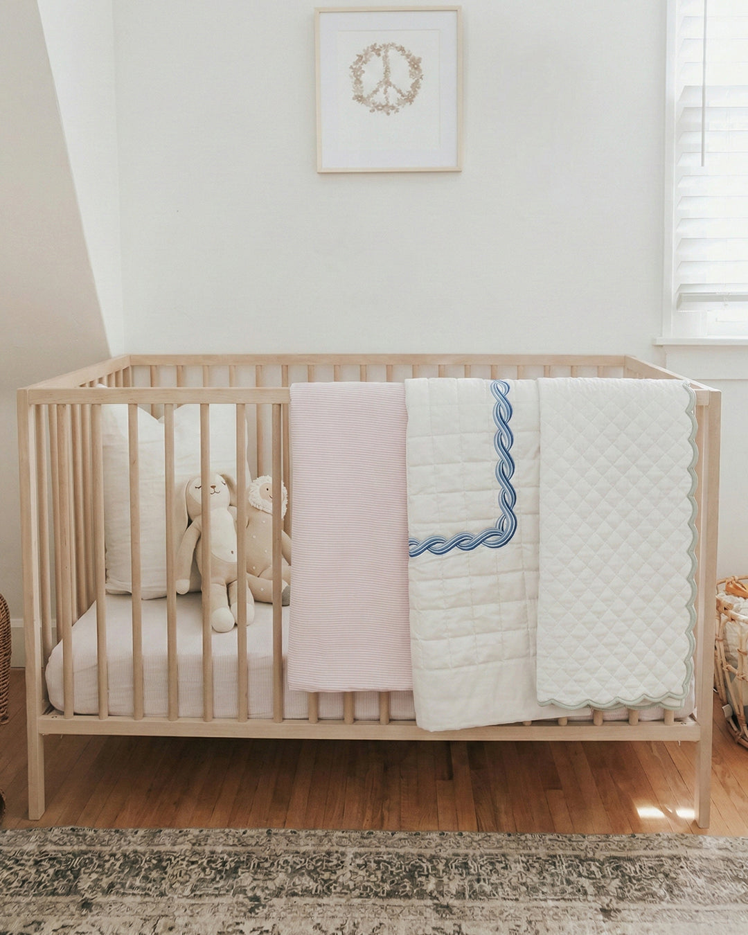 Close-up of Cocolino embroidered Italian cotton nursery linens